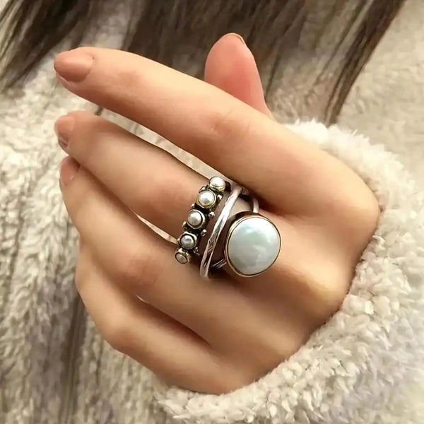 Klassieke zilveren ring met orbit-parel – ring van Alma Sieraden